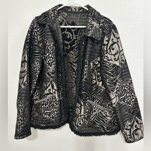 Gorgeous women’s tan-jay jacket with animal print embroidery.